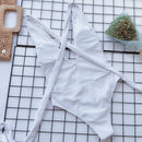 Maillot de bain une pièce noué en V profond à col licou