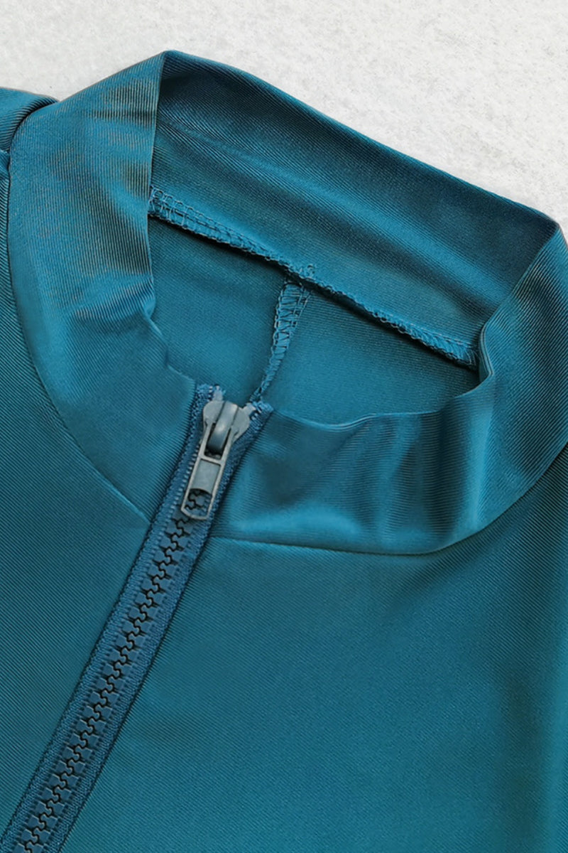 Ensemble de bain casquette, haut à quart de zip et pantalon