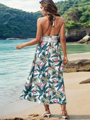 Robe caraco mi-longue imprimée à col licou et détails en dentelle