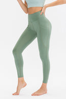 Leggings activos largos de corte ajustado con bolsillos
