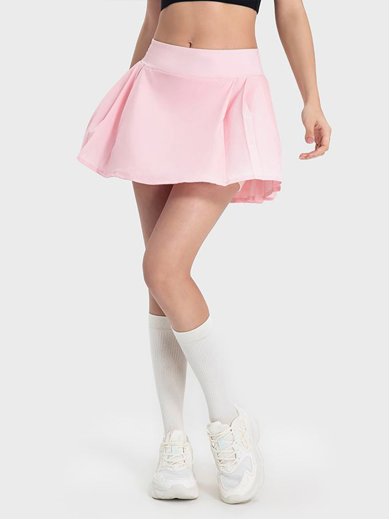 Falda activa con cintura media y detalle plisado