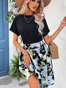 Vestido bicolor con cuello redondo y mangas con puños