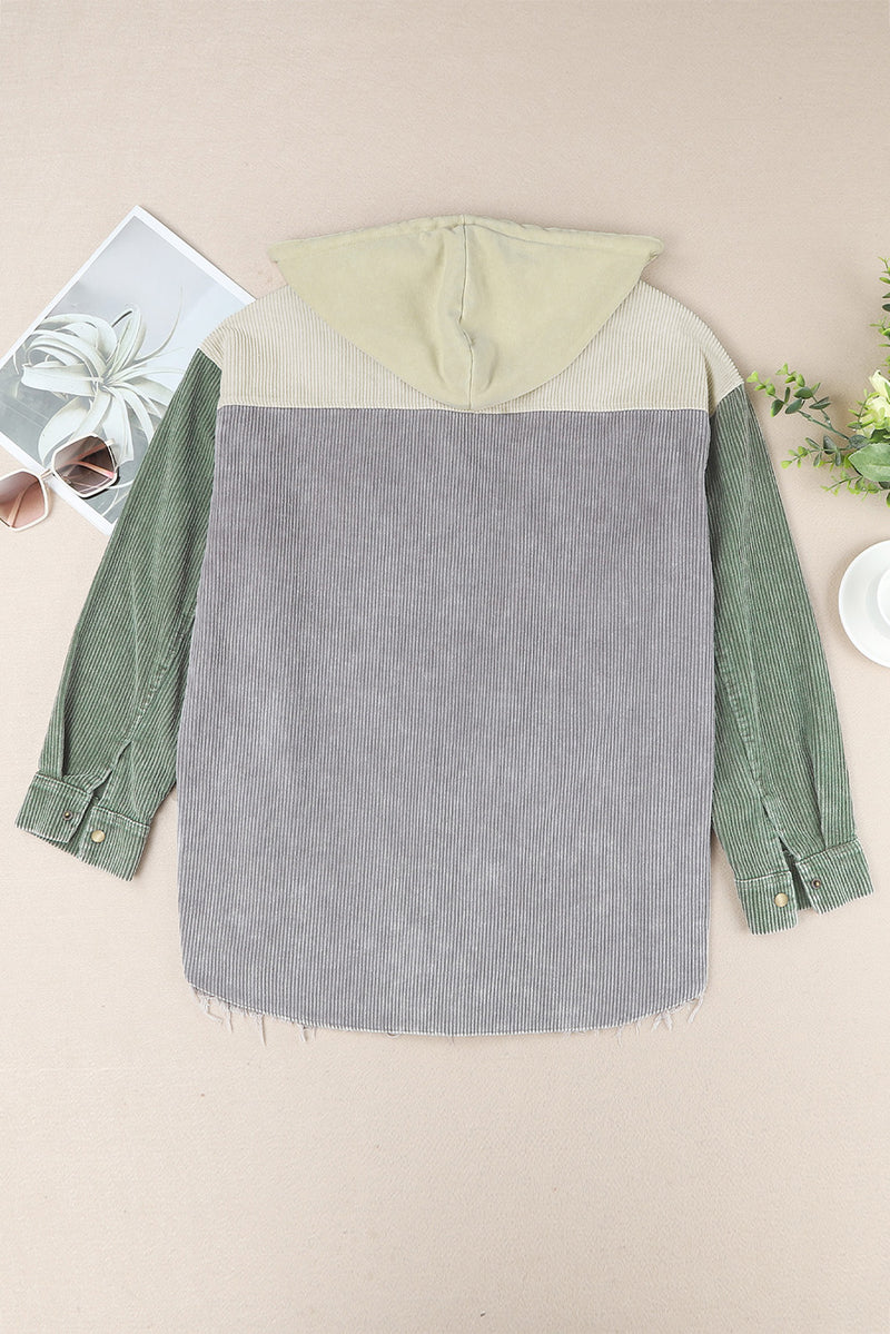 Veste en velours côtelé à capuche avec boutons-pression sur le devant