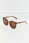 Lunettes de soleil œil de chat en polycarbonate à monture complète