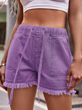 Short en denim à ourlet brut avec cordon de serrage